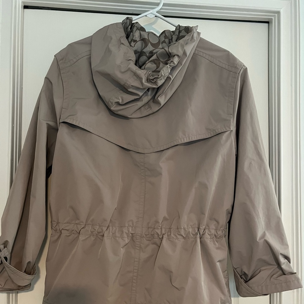 Barely worn Coach rain jacket with signature logo, hood, pockets &cinched waste - Picture 4 of 8